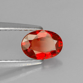 Safira laranja natural 0,60ct, corte oval, VS