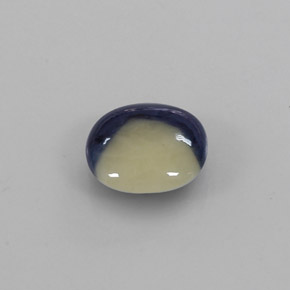 Safira bicolor natural 0,85ct, almofada cortada, translúcido