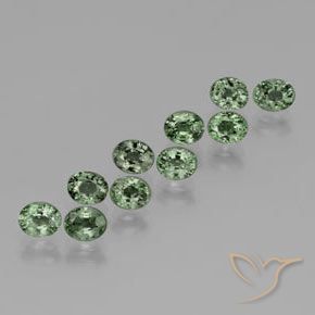 Pedras preciosas de Safira Verde médio-escuro natural de 6.27 ct, oval, VVS-VS