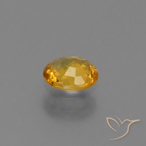Safira Laranja escuro-dourado Natural 0.73ct, oval, VS