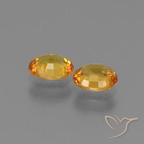 Pedras preciosas de Safira Laranja escuro-dourado natural de 1.41 ct, oval, VS