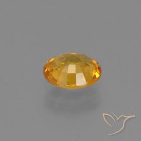Safira Laranja Dourado Profundo Natural 0.61ct, oval, VS