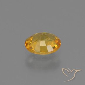 Safira Laranja Dourado Profundo Natural 0.64ct, oval, VS
