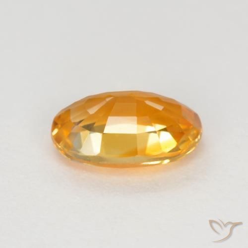 Safira Laranja Profundo-Ouro Natural 0.72ct, oval, VVS-VS