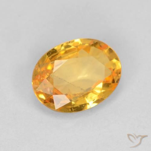 Safira Laranja-dourado médio-claro Natural 0.78ct, oval, VS