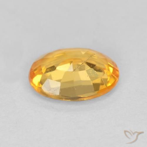Safira Laranja-dourado médio-claro Natural 0.78ct, oval, VS