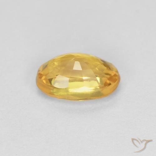Safira Laranja Dourado Profundo Natural 0.70ct, oval, VS