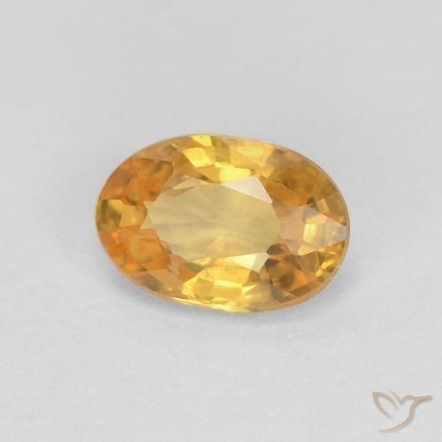 Safira Laranja Dourado Profundo Natural 0.56ct, oval, VS