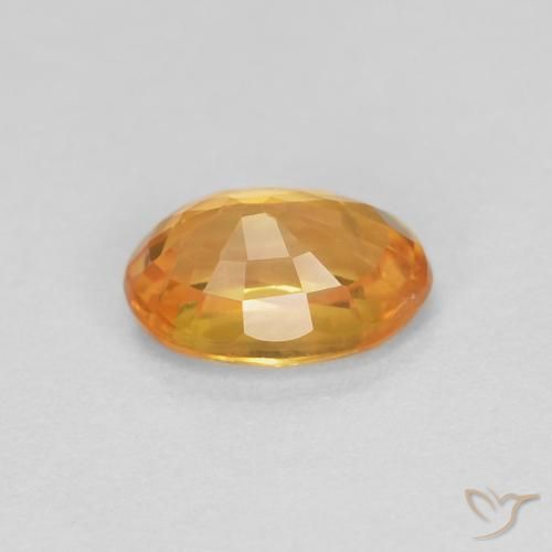 Safira Laranja escuro-dourado Natural 0.62ct, oval, VS