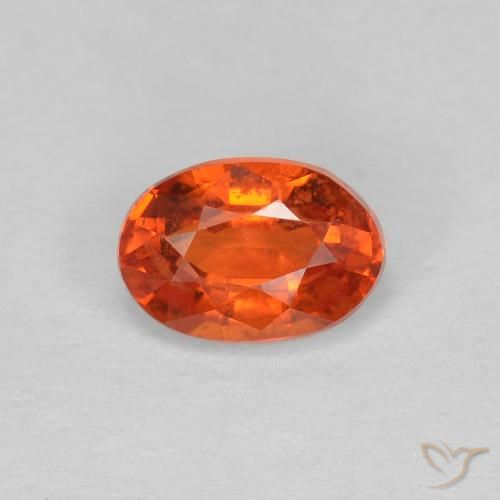 0.68ct Natural laranja avermelhado Safira, oval, VS