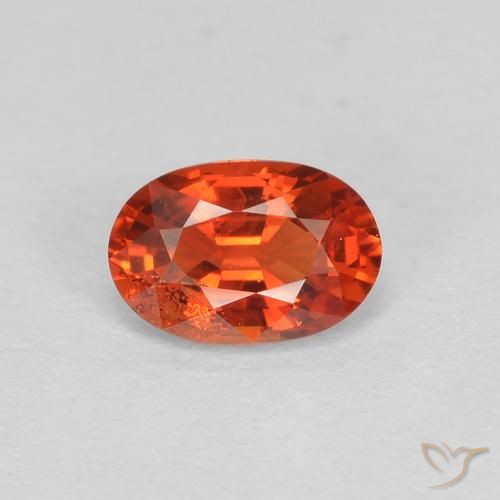0.60ct Natural laranja avermelhado Safira, oval, VS