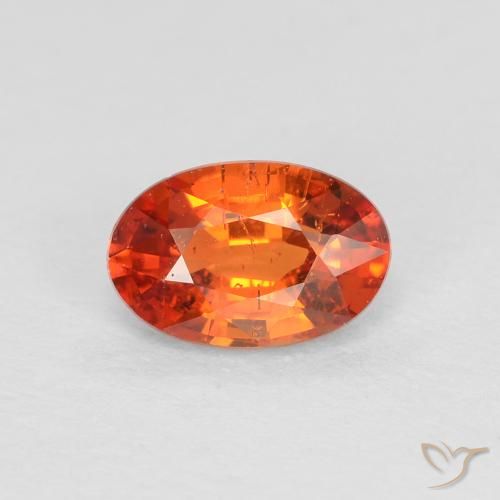 0.65ct Natural laranja avermelhado Safira, oval, VS