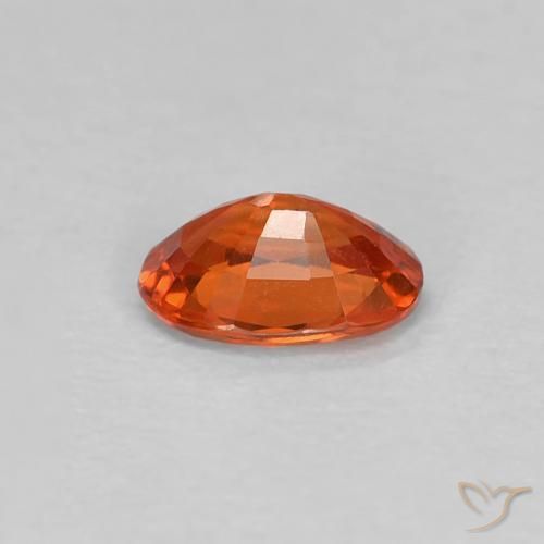 Safira Vermelho Âmbar Profundo Natural 0.47ct, oval, VS