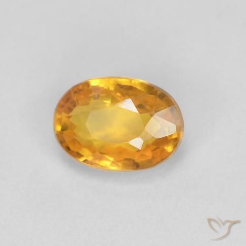 Safira Laranja Profundo-Ouro Natural 0.65ct, oval, VVS