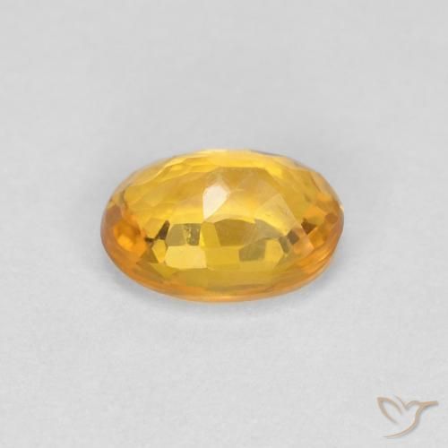 Safira Laranja Profundo-Ouro Natural 0.65ct, oval, VVS