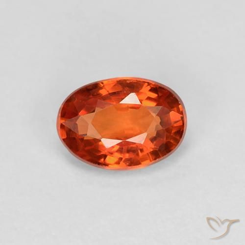 0.60ct Natural laranja avermelhado Safira, oval, VVS