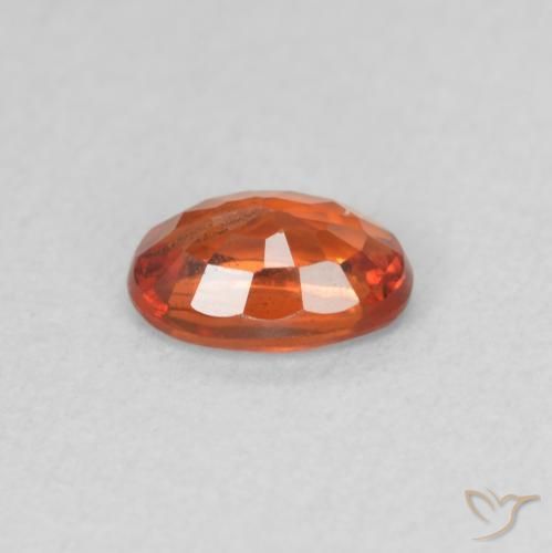 Safira vermelho médio Natural 0.63ct, oval, VS
