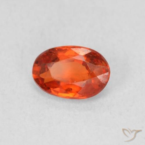 Safira laranja quente Natural 0.62ct, oval, VS