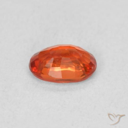 Safira laranja quente Natural 0.56ct, oval, VS