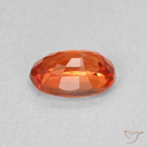 Safira laranja quente Natural 0.73ct, oval, VS