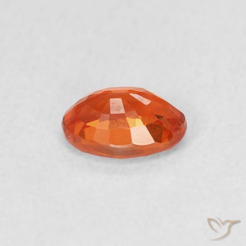 Safira laranja avermelhado Natural 0.69ct, oval, VS