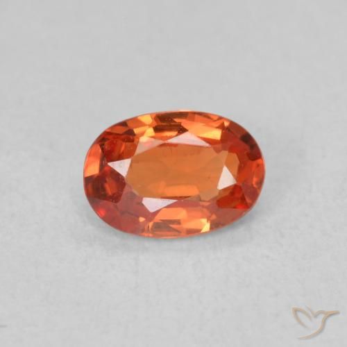 0.54ct Natural laranja avermelhado Safira, oval, VS