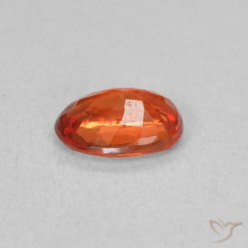 Safira laranja avermelhado Natural 0.57ct, oval, VS