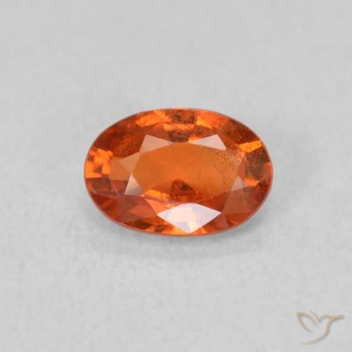 0.65ct Natural laranja avermelhado Safira, oval, VS
