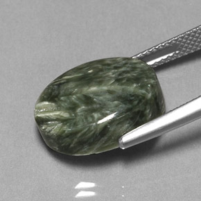 Serafinita verde natural 9,89ct, corte oval, opaco
