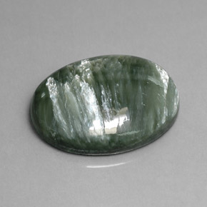 Serafinita verde natural 11,82ct, corte oval, opaco