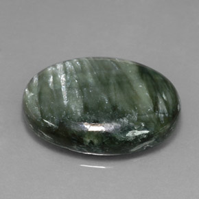 Serafinita verde natural 11,23ct, corte oval, opaco