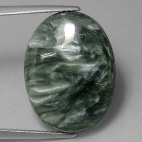 Serafinita verde natural 11,32ct, corte oval, opaco