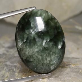 Serafinita verde natural 11,78ct, corte oval, opaco