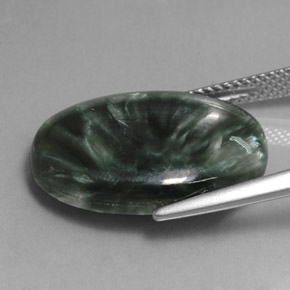 Serafinita verde natural 12,14ct, corte oval, opaco