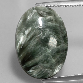 Serafinita verde natural 8,22ct, corte oval, opaco