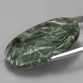 Serafinita verde natural 37,48ct, corte oval, opaco