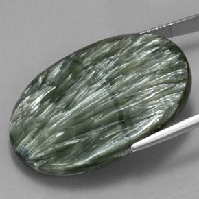 Serafinita verde natural 54,90ct, corte oval, opaco