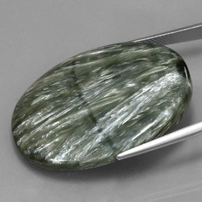 Serafinita verde natural 49,44ct, corte oval, opaco