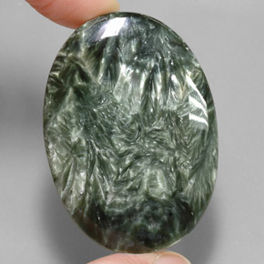 Serafinita verde natural 55,55ct, corte oval, opaco