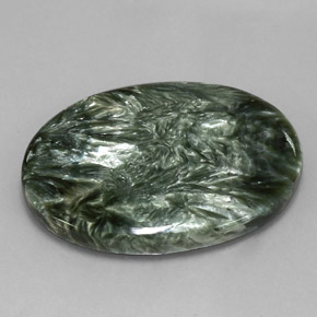 Serafinita verde natural 55,55ct, corte oval, opaco