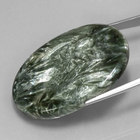 Serafinita verde natural 55,55ct, corte oval, opaco