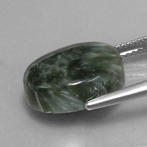 Serafinita verde natural 7,19ct, corte oval, opaco