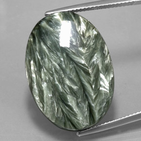 Serafinita verde natural 24,96ct, corte oval, opaco