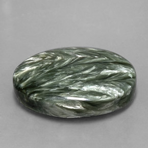 Serafinita verde natural 24,96ct, corte oval, opaco