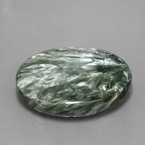 Serafinita verde natural 21,31ct, corte oval, opaco