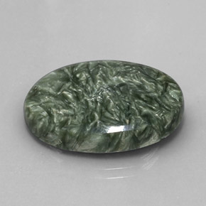Serafinita verde natural 19,04ct, corte oval, opaco