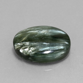 Serafinita verde natural 6,86ct, corte oval, opaco