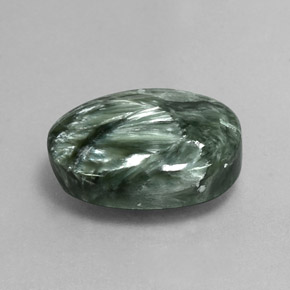 Serafinita verde natural 8,64ct, corte oval, opaco