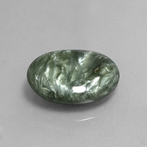 Serafinita verde natural 6,11ct, corte oval, opaco