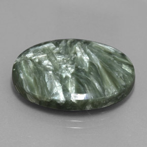 Serafinita verde natural 17,29ct, corte oval, opaco